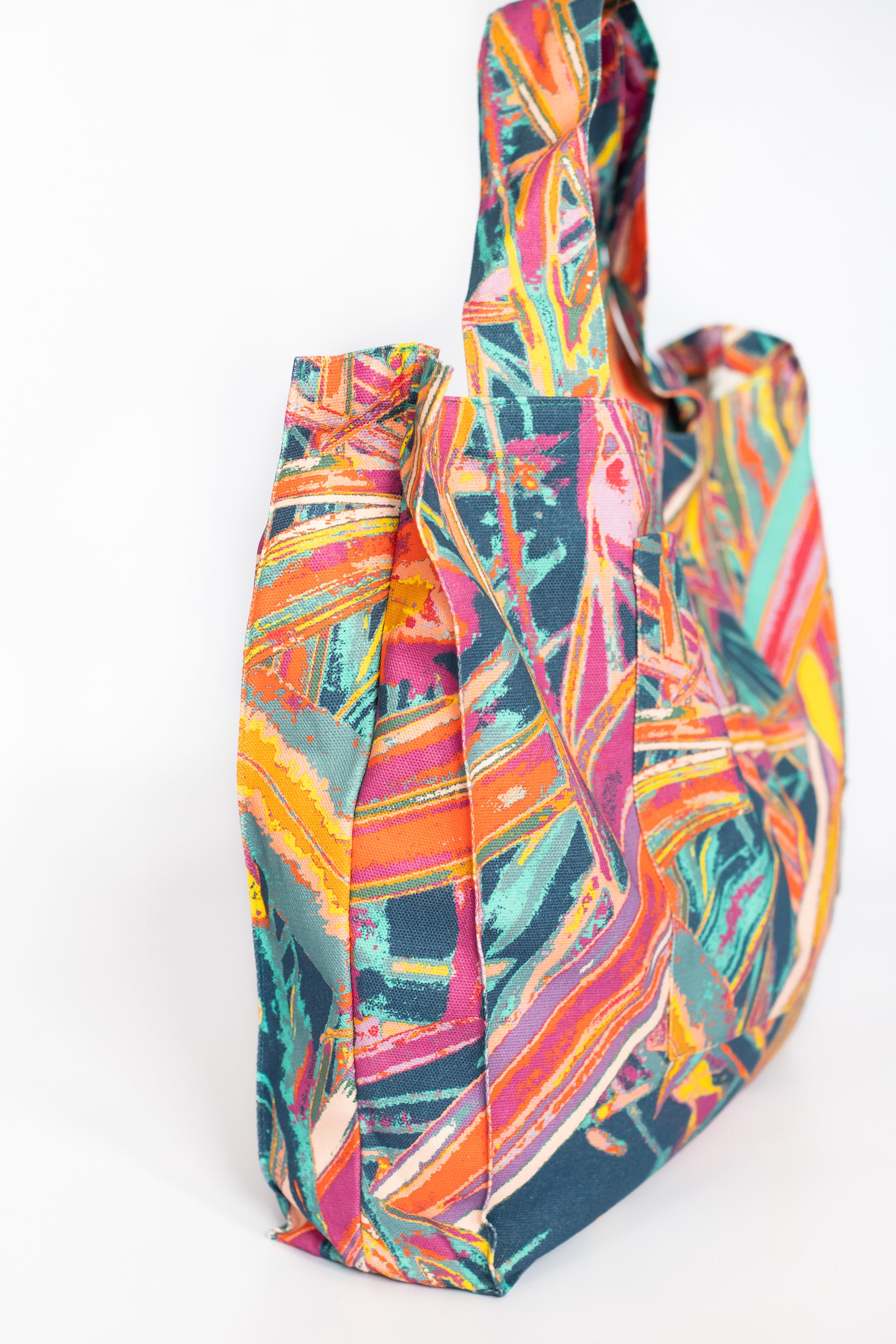 LANYA TROPICANA FROOTI JUNGLE PRINTED DESIGN ORGANIC COTTON CANVAS COLOURFUL MAXIMAL SUSTAINABLE TOTE BAG SIDE VIEW