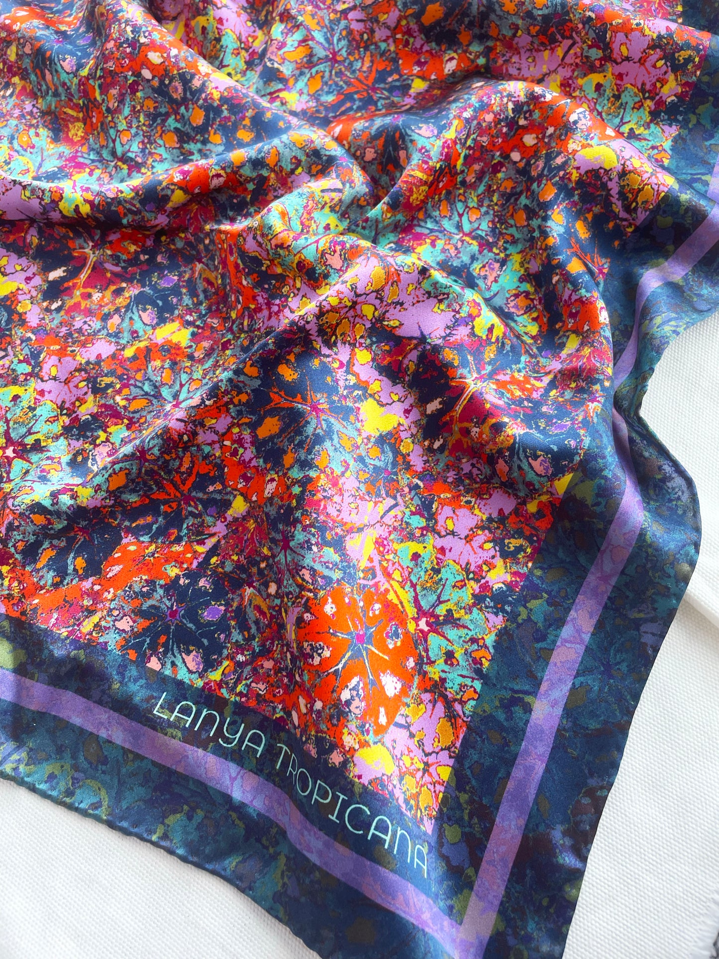 LANYA TROPICANA FROOTI REEF PRINT ORGANIC SILK SCARF EDGE HAND ROLL HEM DETAIL