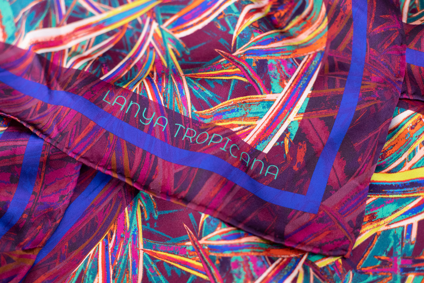LANYA TROPICANA SUNDOWN JUNGLE PRINT ORGANIC SILK SCARF CORNER FABRIC DETAIL