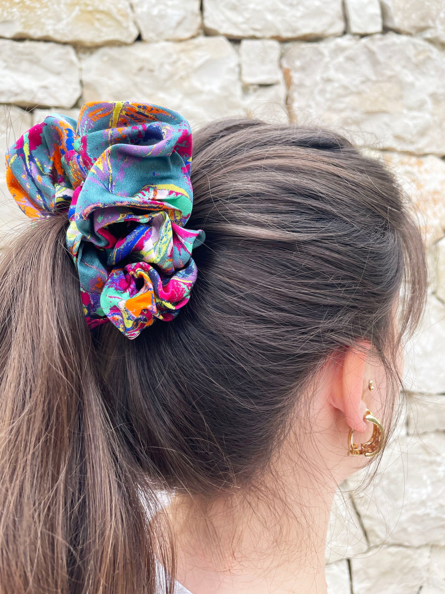 LANYA TROPICANA ZEST COLOURWAY ORCHADIA PRINTED SILK SCRUNCHIE WORN IN HAIR UPCLOSE