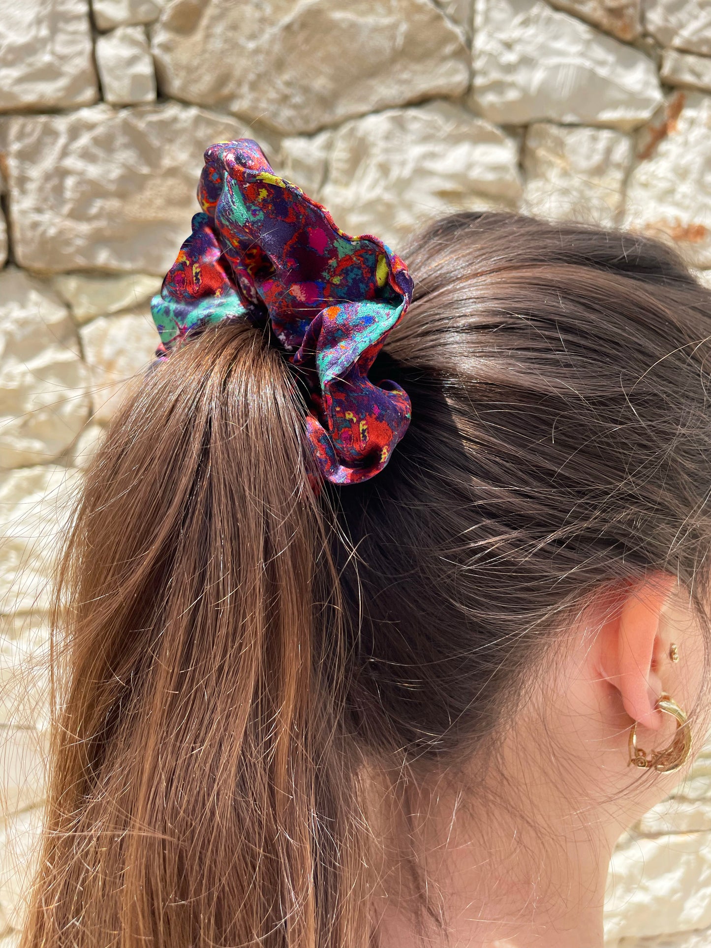 LANYA TROPICANA SUNDOWN REEF SILK SCRUNCHIE AS WORN IN HAIR UPCLOSE