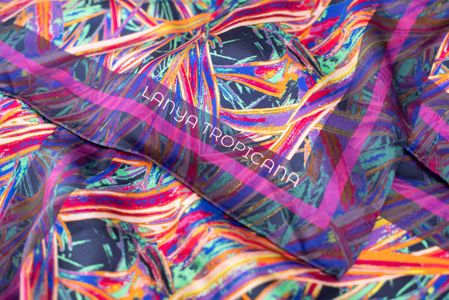 LANYA TROPICANA ZEST JUNGLE PRINT ORGANIC SILK SCARF SQUARE FOLD FABRIC DETAIL